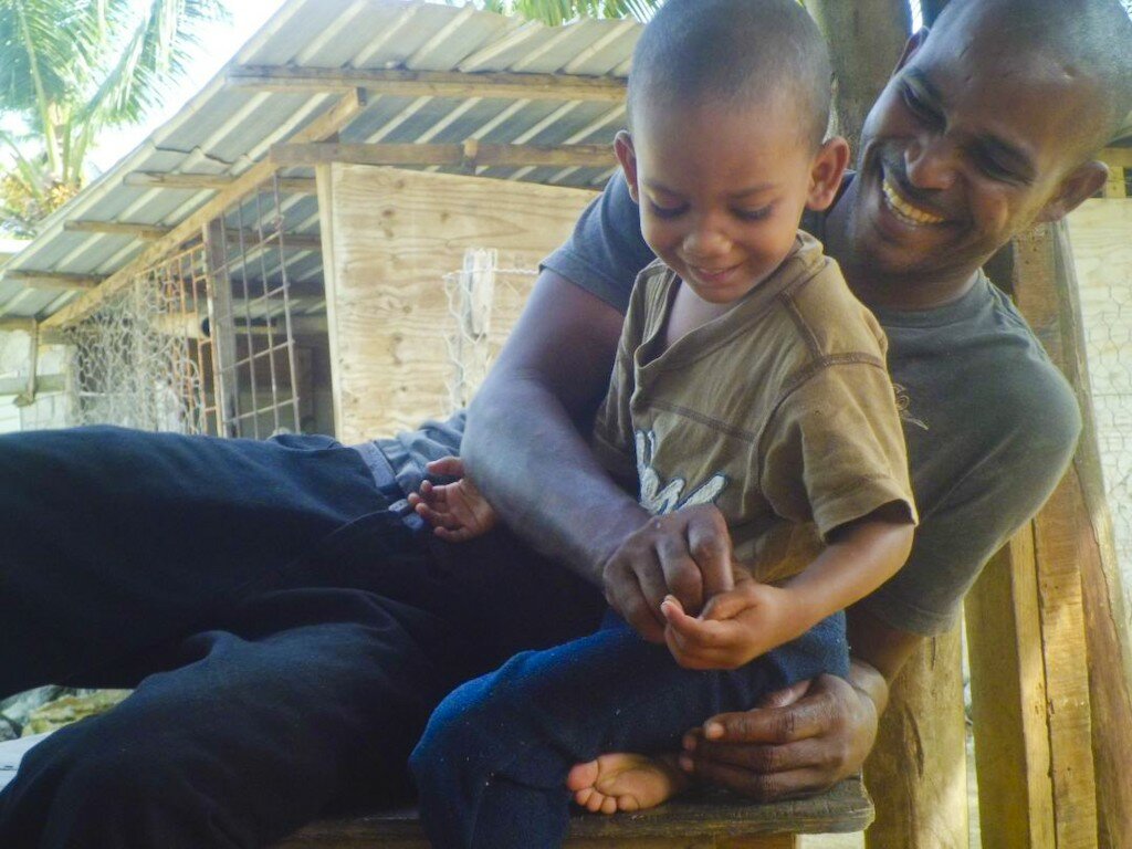 Family photo of TJ with his dad Terry Elibox at his home in Marc, St. Lucia.