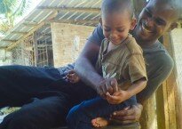 Family photo of TJ with his dad Terry Elibox at his home in Marc, St. Lucia.