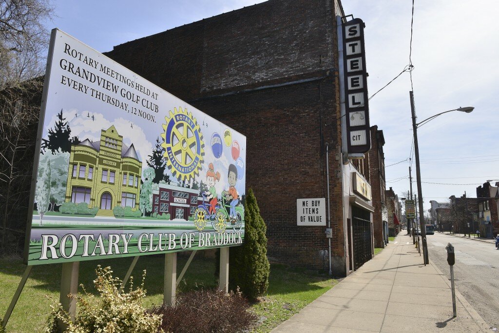 A sign in the town’s core advertises the Rotary Club 